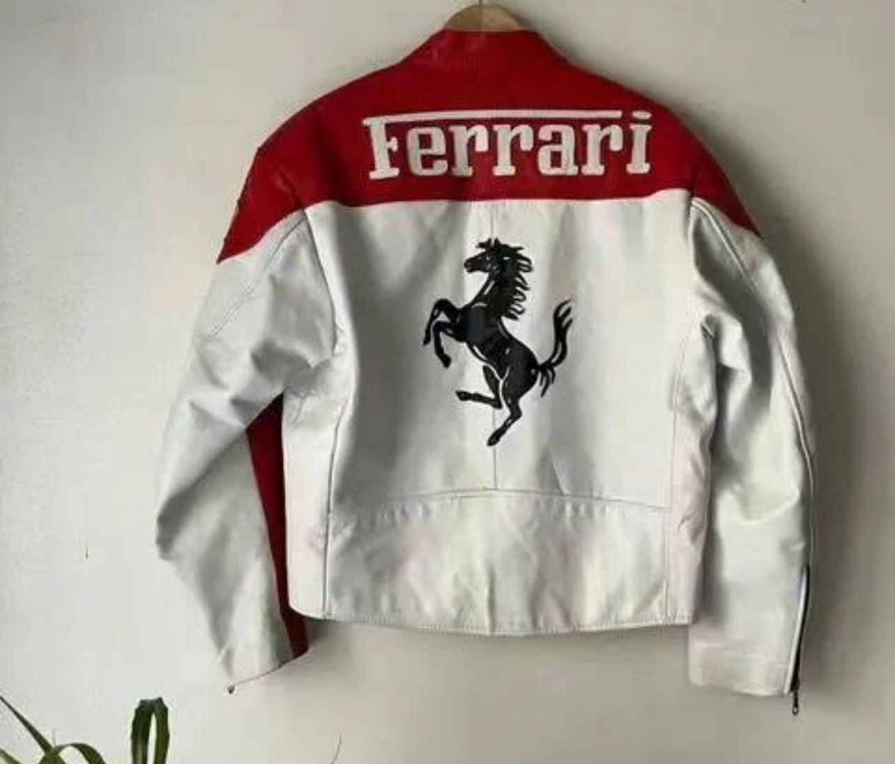 Back view of Ferrari F1 Motorsport Jacket featuring sponsor patches