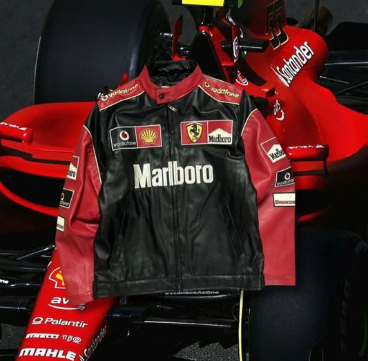 Close-up sleeve sponsor patches on Red Bull F1 racing jacket
