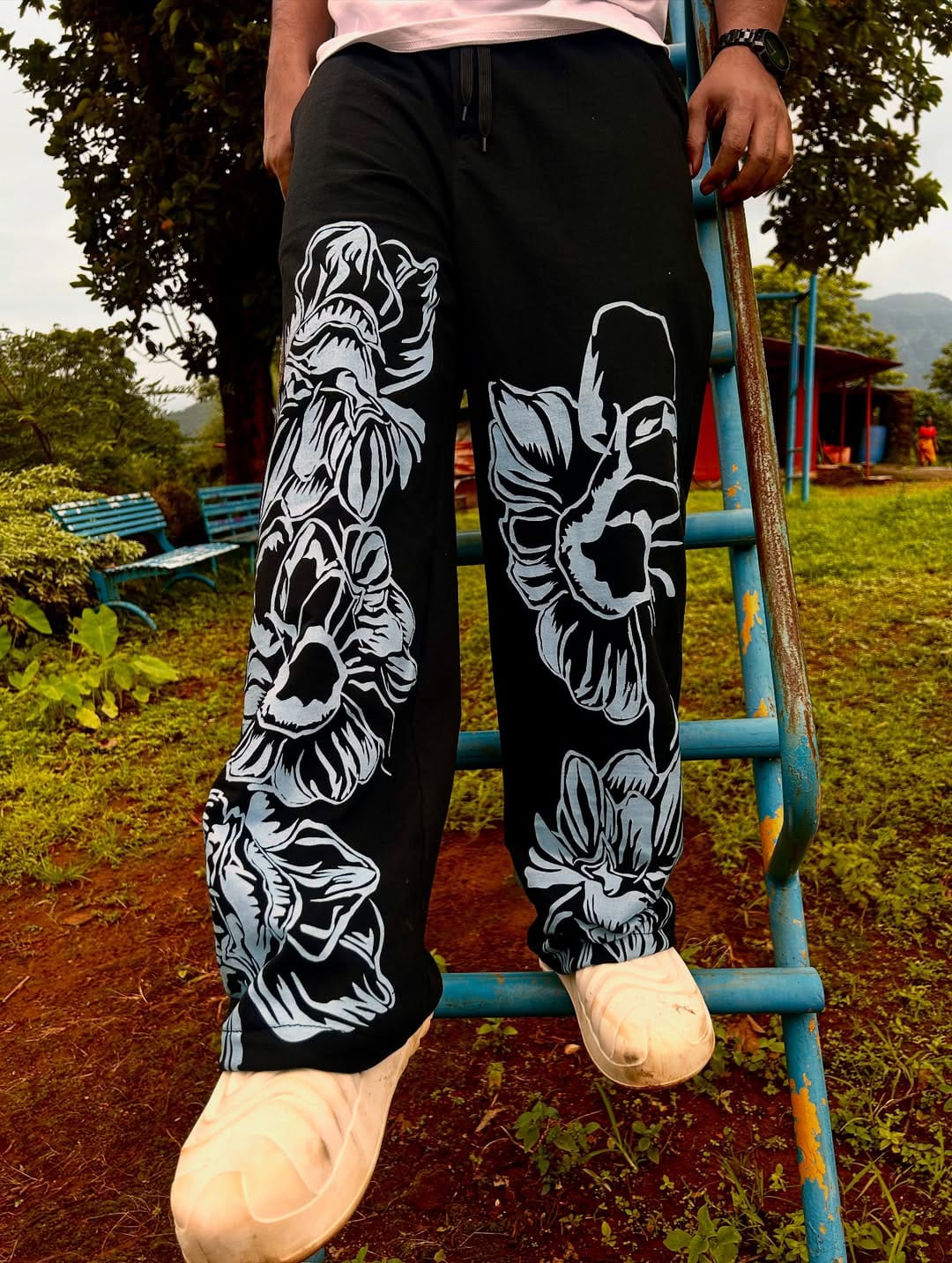Close-up of floral print detail on pant leg
