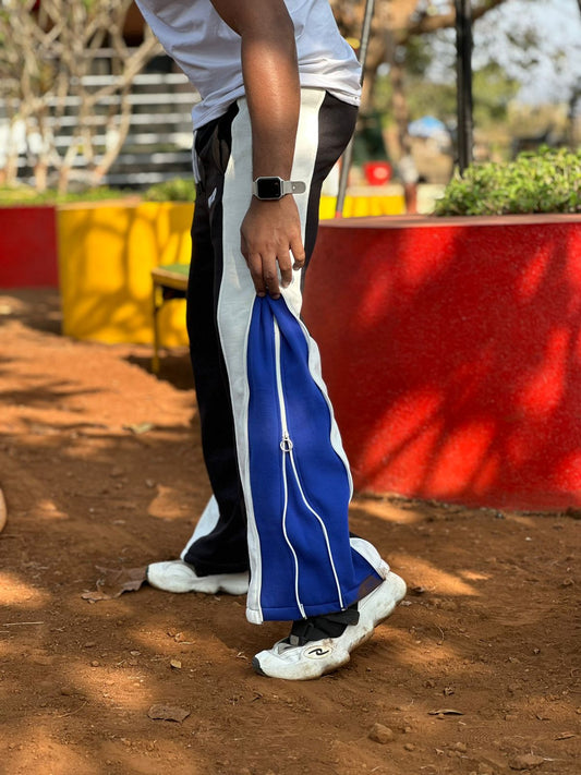 Side angle of Zip Trip Baggy Fit Pant highlighting relaxed baggy silhouette