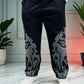 Front view of Depth Flamez Pant with bold puff flame print on both legs
