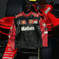 Close-up sleeve sponsor patches on Red Bull F1 racing jacket
