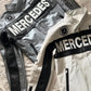Embroidered Mercedes-Benz logo on racing leather jacket