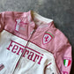 Close-up of Ferrari prancing horse embroidered on pink racing jacket