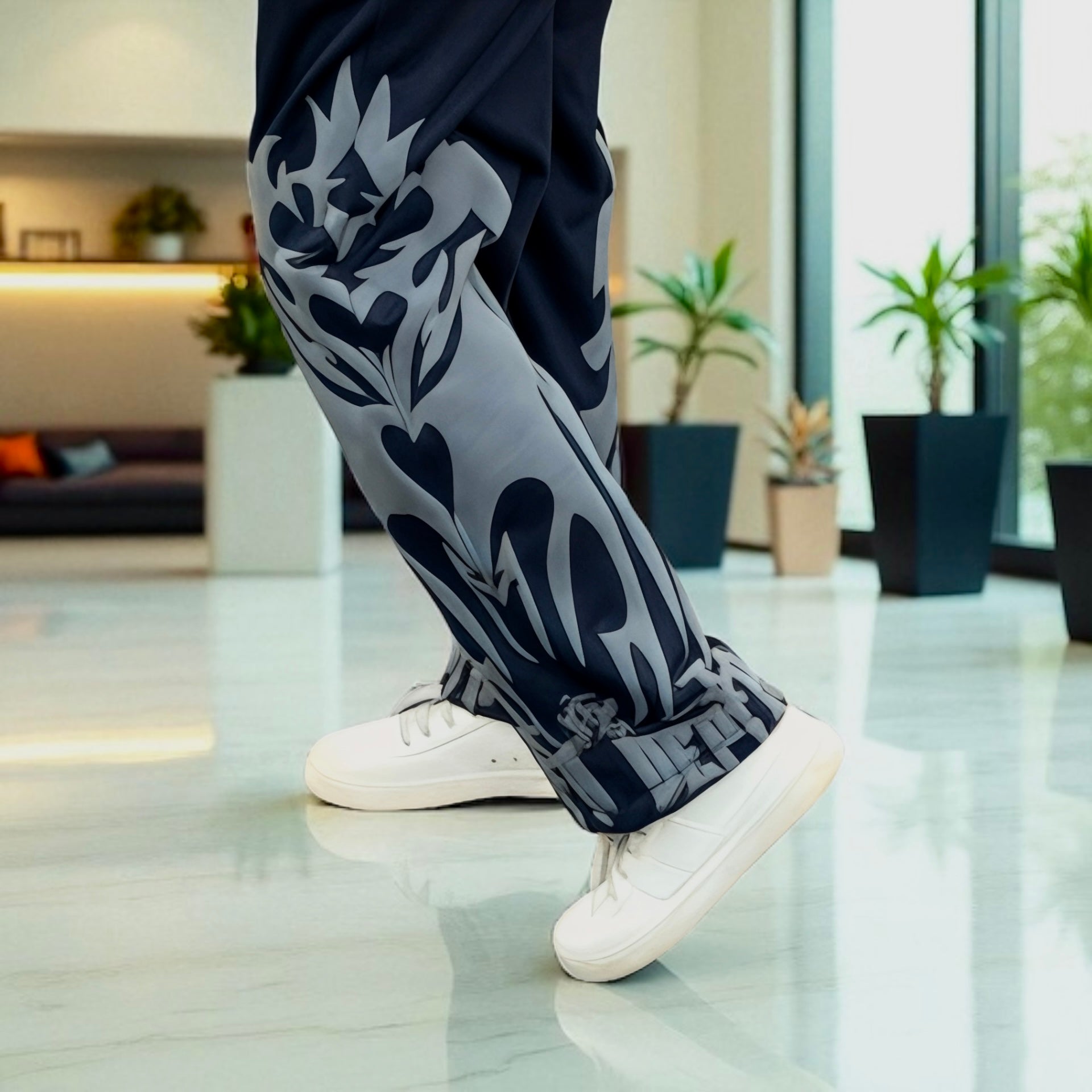 Side view showcasing straight fit and flame graphic design