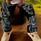 Sitting shot showing floral print drape on straight-fit pant