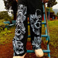 Close-up of floral print detail on pant leg