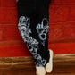 Model styling pant with oversized tee — full-look image