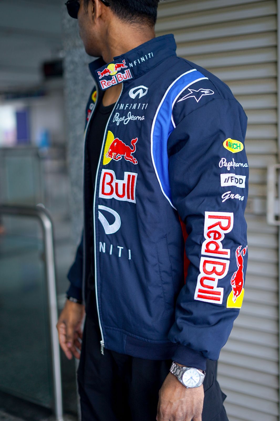 Model wearing Red Bull Racing Jacket – oversized motorsport jacket for men